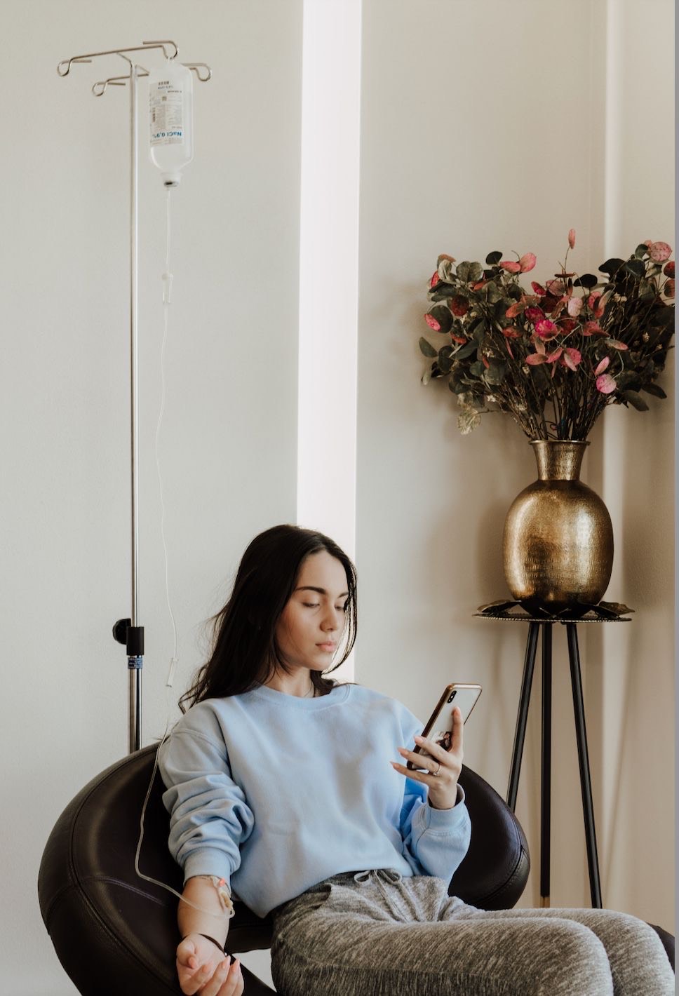 woman receiving iv drip treatment in london
